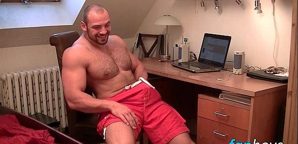  Muscular dude Tom enjoys stroking his meaty tool